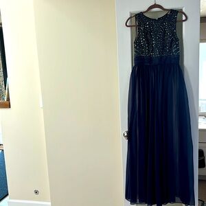 Maxi length baby gown with beaded detail on the top.